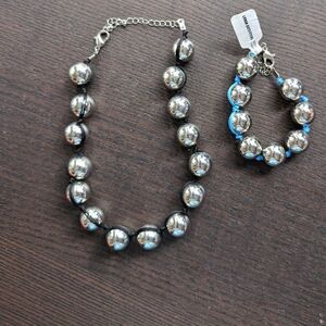 Silver tone black corded choker and NWT blue corded bracelet set 25$for the set